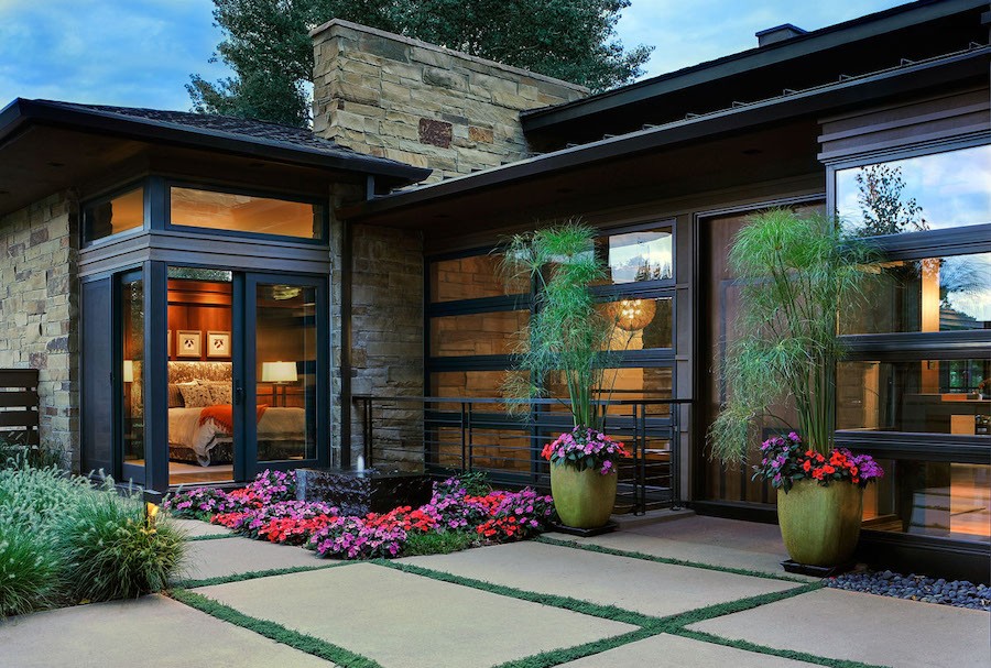 The entrance to a luxurious Colorado home with designer Lutron lighting. 