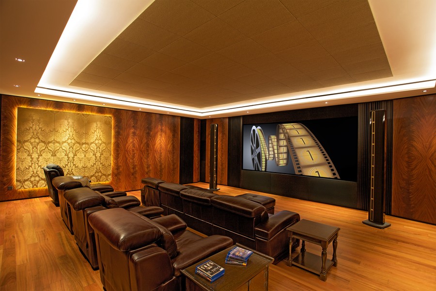 A pair of Steinway LS Concert high-end audio speakers in an opulent Denver home theater. 